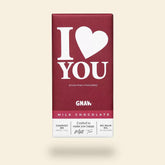 A red milk chocolate Gnaw bar with the text 'I love you' printed in white, indicating it is a gift product.